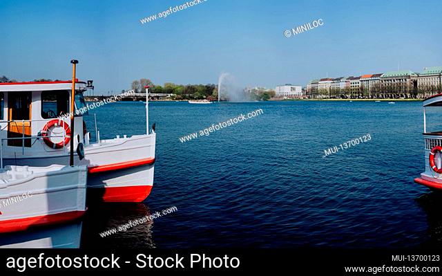 Cruise tourist boat on the Pier on Alster Lake, Hamburg Germany