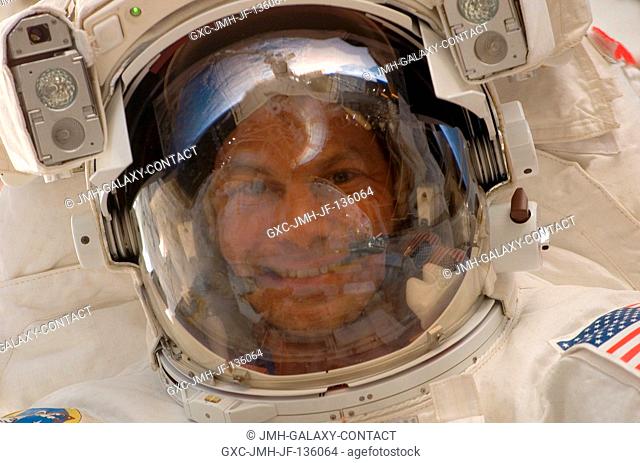 Astronaut Stanley Love, STS-122 mission specialist, participates in the first scheduled session of extravehicular activity (EVA) as construction and maintenance...