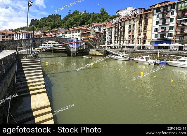 Ondarroa Traditional village in Basque Country with stone bridge over Artibai river.Ondarroa is a town and municipality located in the province of Biscay
