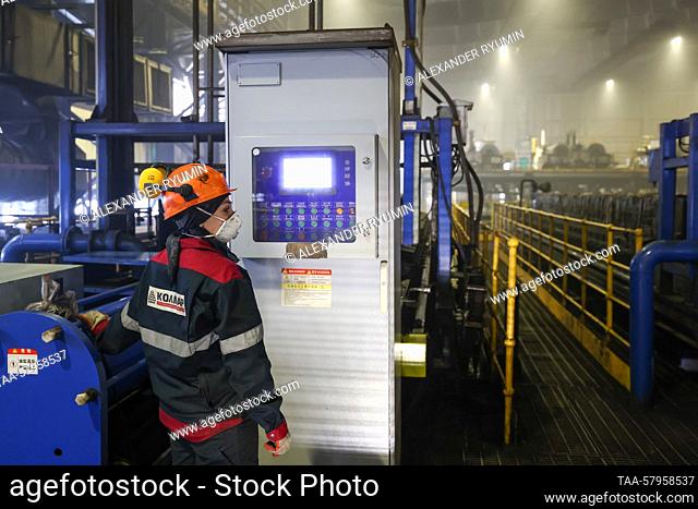 RUSSIA, REPUBLIC OF SAKHA (YAKUTIA) - MARCH 19, 2023: A worker wears a hard hat at the Inaglinskaya-2 mining and processing factory