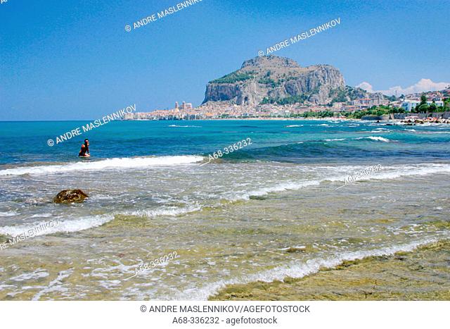 Beach at Cefalu. La Rocca in background. Sicily. Italy