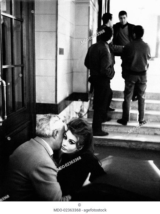 Italian director and actor Vittorio De Sica hugging Italian actress Sophia Loren (Sofia Villani Scicolone) in a break during the shooting of the film The...