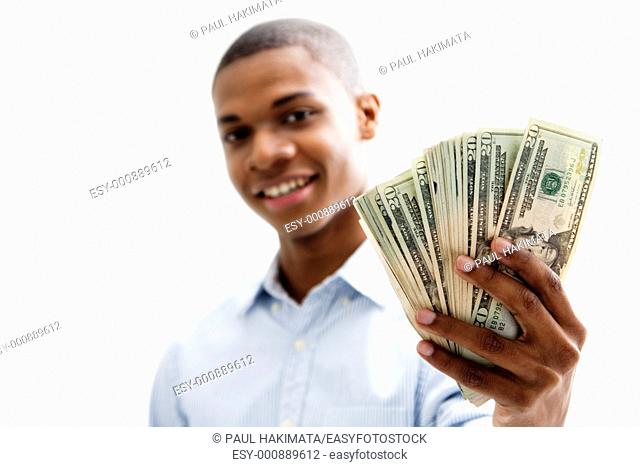 African man smiling and holding money, isolated