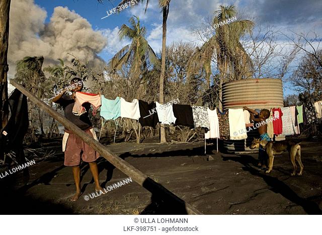 Daily life on Matupit Island has become very difficult due to constant ash fall, Tavurvur Volcano, Rabaul, East New Britain, Pap