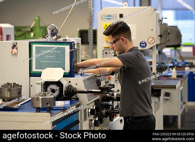 FILED - 02 March 2023, Lower Saxony, Duderstadt: A trainee takes a test on a lathe at the orthopedic technology manufacturer ottobock