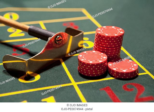 Close up of gambling chips on gaming table