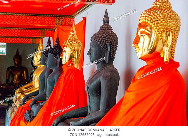 Golden and black Buddha at Wat Phra temple, Bangkok, Thailand