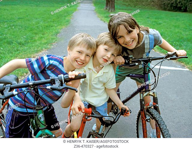 Children riding bicycles together