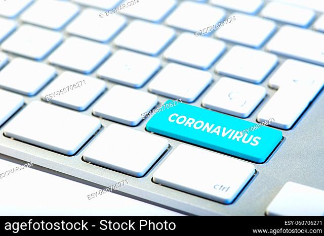 Coronavirus COVID-19 outbreak concept. Keyboard with blue key and CORONAVIRUS message