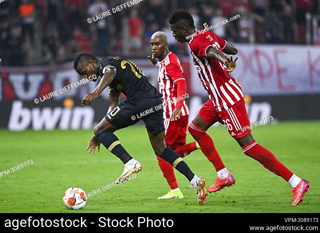 Antwerp's Ally Samatta Mbwana and Olympiacos' Pape Abou Cisse fight for the ball during a soccer game between Greek Olympiacos F.C