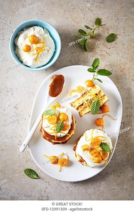 Toffee tartlets with orange cream cheese and physalis