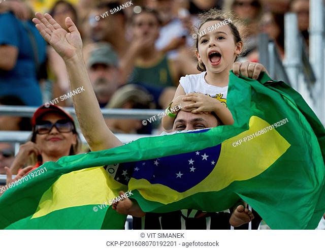 Brazilian fans watch the match Marketa Slukova and Barbora Hermannova of the Czech Republic against Agatha Bednarczuk and Barbara Seixas of Brazil at the 2016...