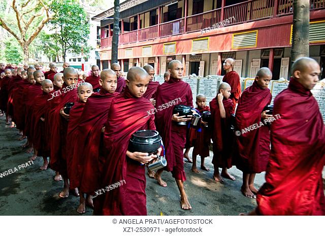 Collecting of Alms Monks at Maha Ganayon Kyaung, Amarapura, Myanmar