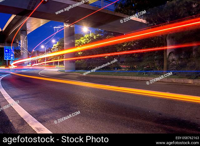 cars through the city at night