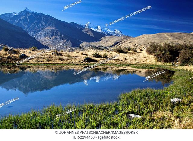 Reflections in a mountain lake, Cordillera Blanca, Andes, Peru, South America