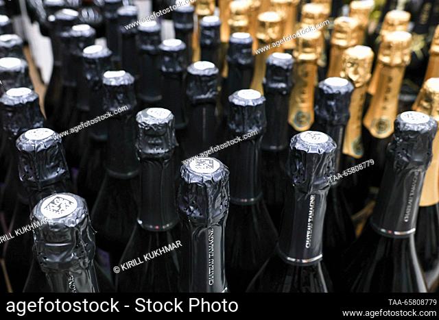 RUSSIA, NOVOSIBIRSK - DECEMBER 16, 2023: Sparkling wine is on sale in an Auchan hypermarket. Kirill Kukhmar/TASS