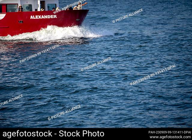 09 September 2023, Mecklenburg-Western Pomerania, Sassnitz: An excursion boat sails in sunny weather from the port of Sassnitz with tourists for a side trip to...