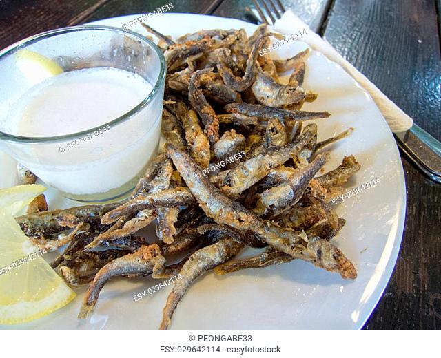 fried anchovy with garlic sauce mujdei