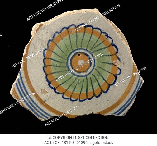 Fragment of the majolica dish, polychrome, concentric circles containing rosette, plate crockery holder soil find ceramic earthenware glaze