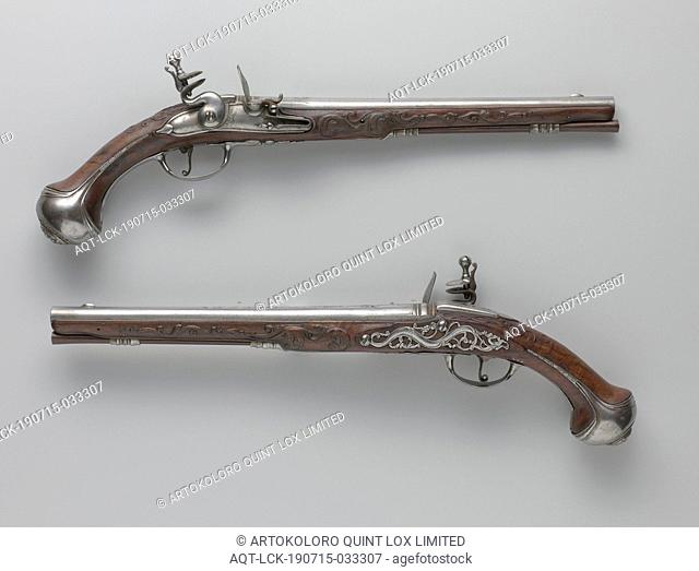 Flint gun, Part of a couple. The lock is almost undecorated, signed. The barrel is carved in relief with branched foliage and a dragon