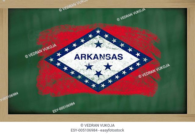 flag of us state of arkansas on blackboard painted with chalk