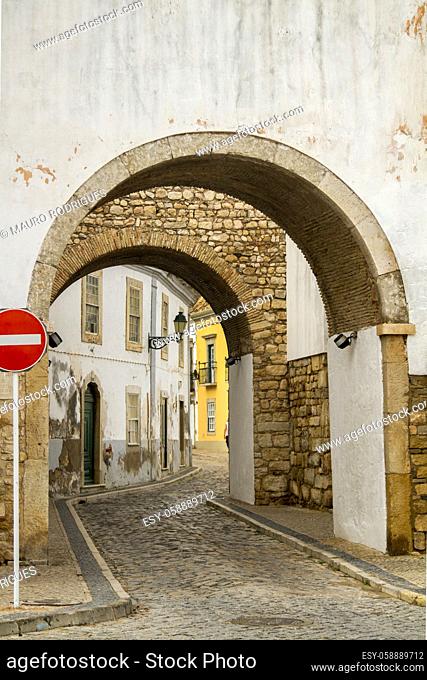View of the well known arch entrance of Faro city, Portugal