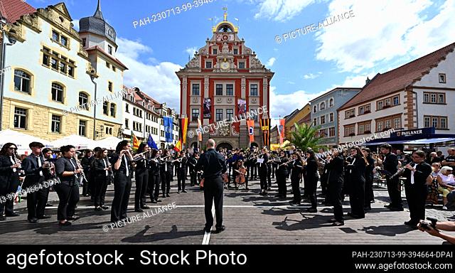 13 July 2023, Thuringia, Gotha: Musicians from Spain play at the start of the 58th Europeade - European Folk Festival on Gotha's main market square