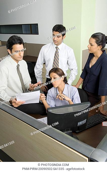 Business executives discussing in an office