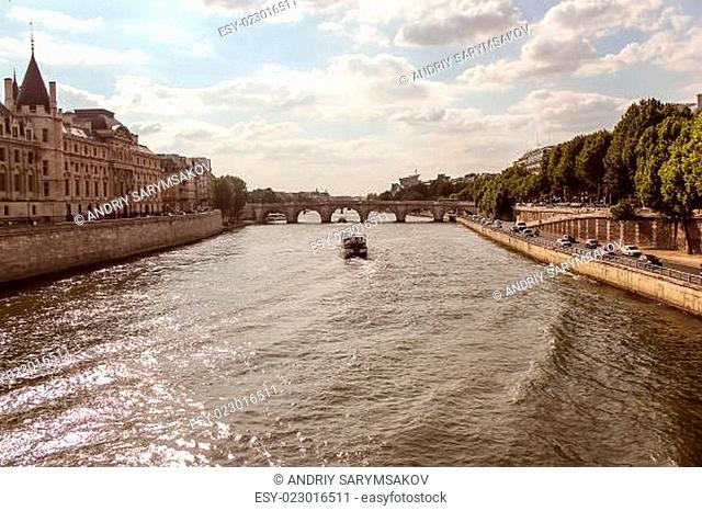 Notre Dame with boat on Seine, France