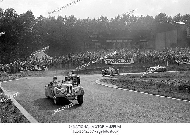 LG Johnson's Frazer-Nash BMW 328 leading two MG PBs, Imperial Trophy, Crystal Palace, 1939. Artist: Bill Brunell