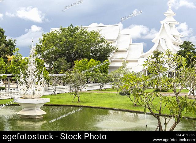 Lake at the White Temple (Wat Rong Khun); a Buddhist temple designed and constructed by national artist Chalermchai Kositpipat and one of the most recognizable...