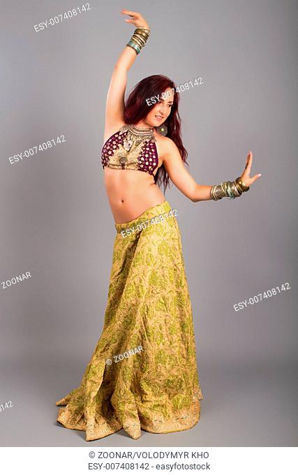 Young beautiful belly dancer
