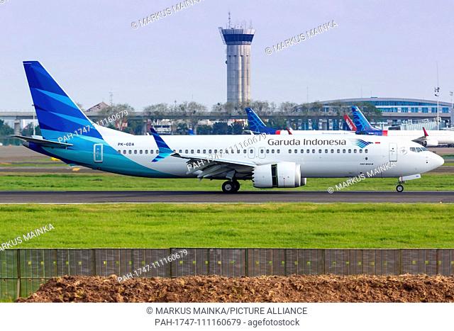 Jakarta, Indonesia - January 27, 2018: Garuda Indonesia Boeing 737-8 MAX airplane at Jakarta Soekarno-Hatta airport (CGK) in Indonesia
