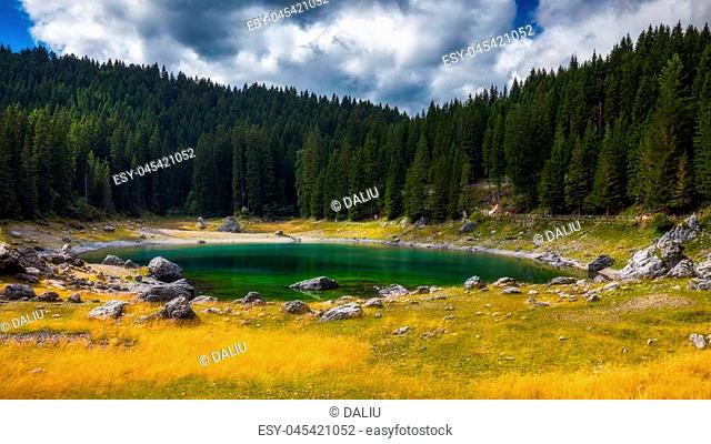 Carezza lake (Lago di Carezza, Karersee) with Mount Latemar, Bolzano province, South tyrol, Italy
