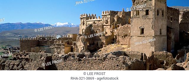 Ruins of Glaoui kasbah at Telouet, with snow capped High Atlas Mountains in distance, Telouet, Morocco, North Africa, Africa