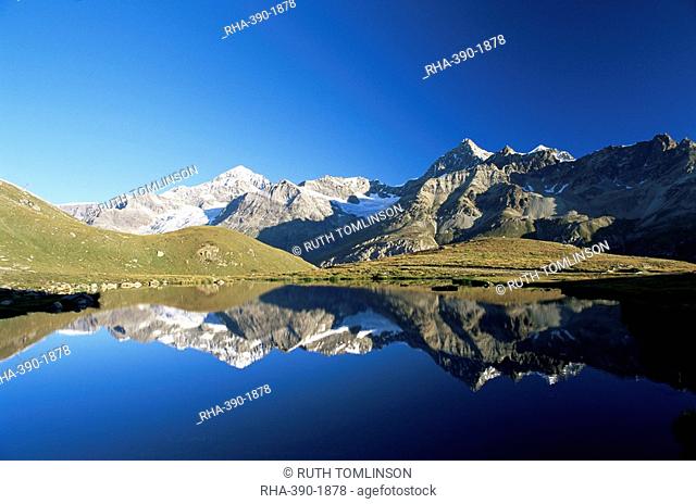 Dent Blanche and Ober Gabelhorn reflected in lake, Zermatt, Valais, Switzerland, Europe