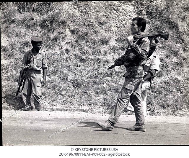 Aug. 11, 1967 - White mercenaries and Katangan gendarmes patrolling of the town of Bukavu, guarding it from possible attack by teh Soldiers of Congolese...