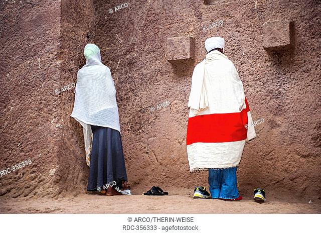 Pilgrim, pilgrims, traditional white shawl, ceremony, Monolithic rock-cut church, Bete Medhane Alem, Lalibela, Amhara Region, Northern Ethiopia