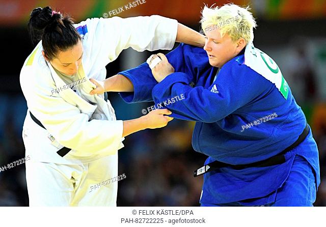 Jasmin Kuelbs of Germany (blue) in action against Ksenia Chibisova of Russia during the Women +78 kg Elimination Round of 32 of the Judo events during the Rio...