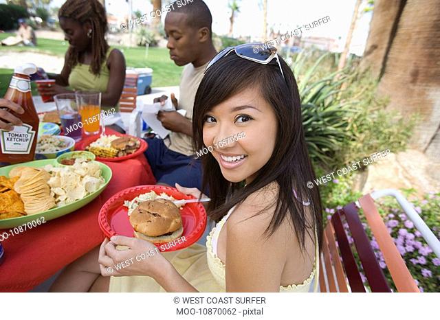 Young Woman at Barbecue Portrait