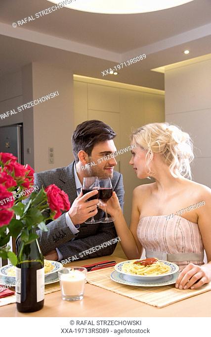 Couple having romantic dinner at home