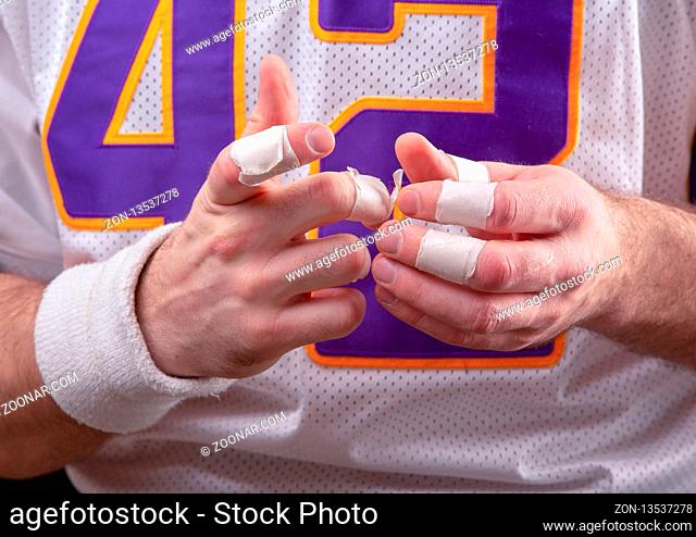 Taped fingers Of American footballer
