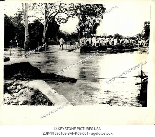 Jan. 03, 1958 - Hundreds Perish in the Ceylon Floods. Sugar Workers Evacuated over at Temporary Bridge. It is feared that the death role may reach 1