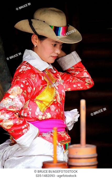 A Mosuo girl in traditional dress  Yunnan Ethnic Village  Kunming  China