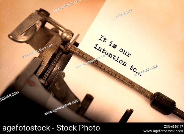 Close-up of an old typewriter with paper, selective focus, It is our intention to