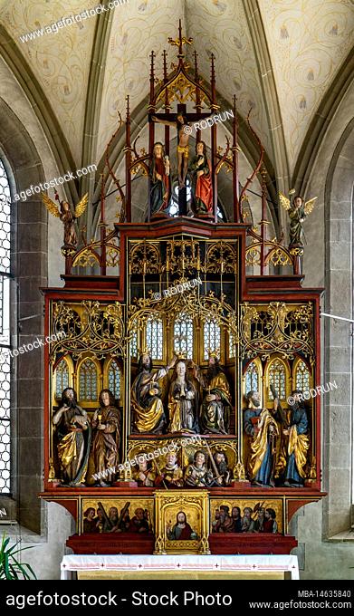 The altar of the church, St. Ursula in Oberndorf, is an important late Gothic carved altar that was created around 1510/15