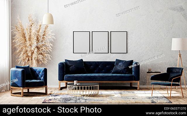 Three blank poster frames on gray wall mockup in modern luxury interior design with dark blue sofa, armchairs near cofee table, fancy rug on wooden floor