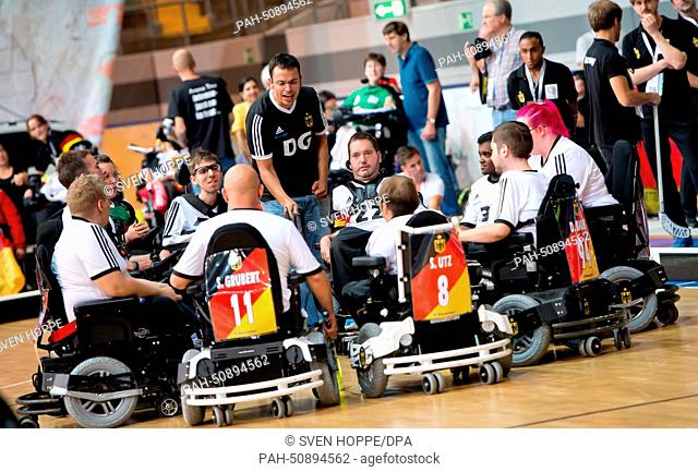 The German team huddles up beforte the opening match of the electric wheelchair hockey world championships between Germany and Belgium in Munich, Germany