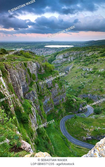 England, Somerset, Cheddar. View down to a winding road through the Cheddar Gorge, a limestone gorge in the Mendip Hills