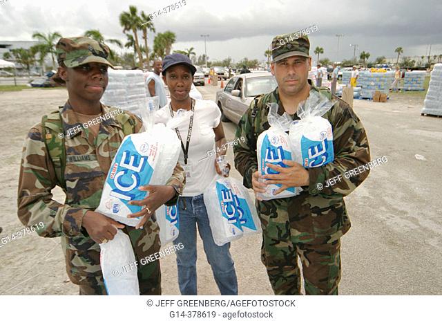 Hurricane Frances damage. Fairgrounds, National Guards and volunteer distribute free ice to victims. Southern Boulevard, West Palm Beach